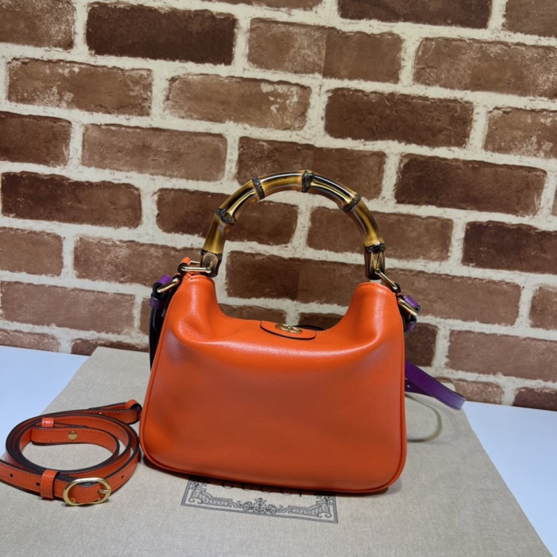 G*u*i top handle bags